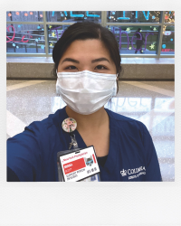 Nurse wearing face mask.